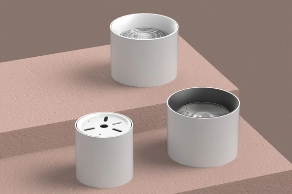 Cup seri lampu downlight surface-mounted SURF-C dalam warna putih, hitam, gun black, dan perak mengkilap