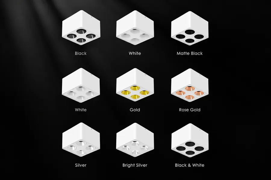 Faretto scatolato QUAD-S con riflettori oro champagne installato su soffitto in cemento di un negozio, senza foro di incasso