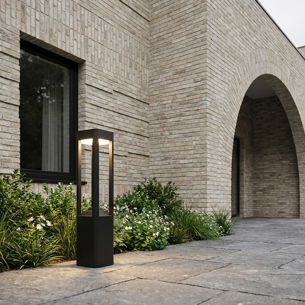 LAN SER modern bollard row lighting a paved garden walk