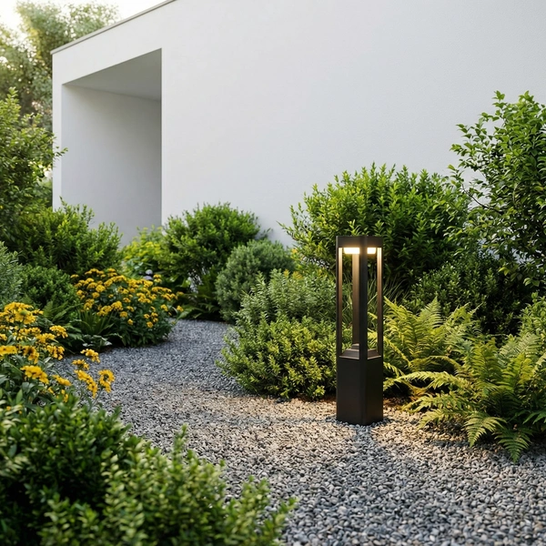 Sand Gray LAN square pathway bollard beside lawn edge at dusk