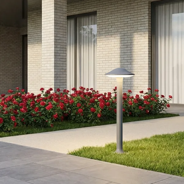 Row of MUSH-M garden bollards along a shrub walkway