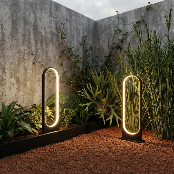 ORB halo arch lamp flanking a stone garden walkway at night