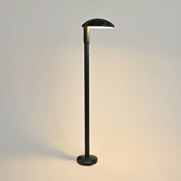 Gray SLIM-SS slim column bollard beside walkway edge